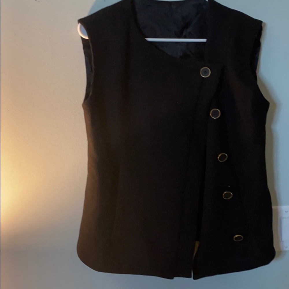 Black coat with gold and black buttons